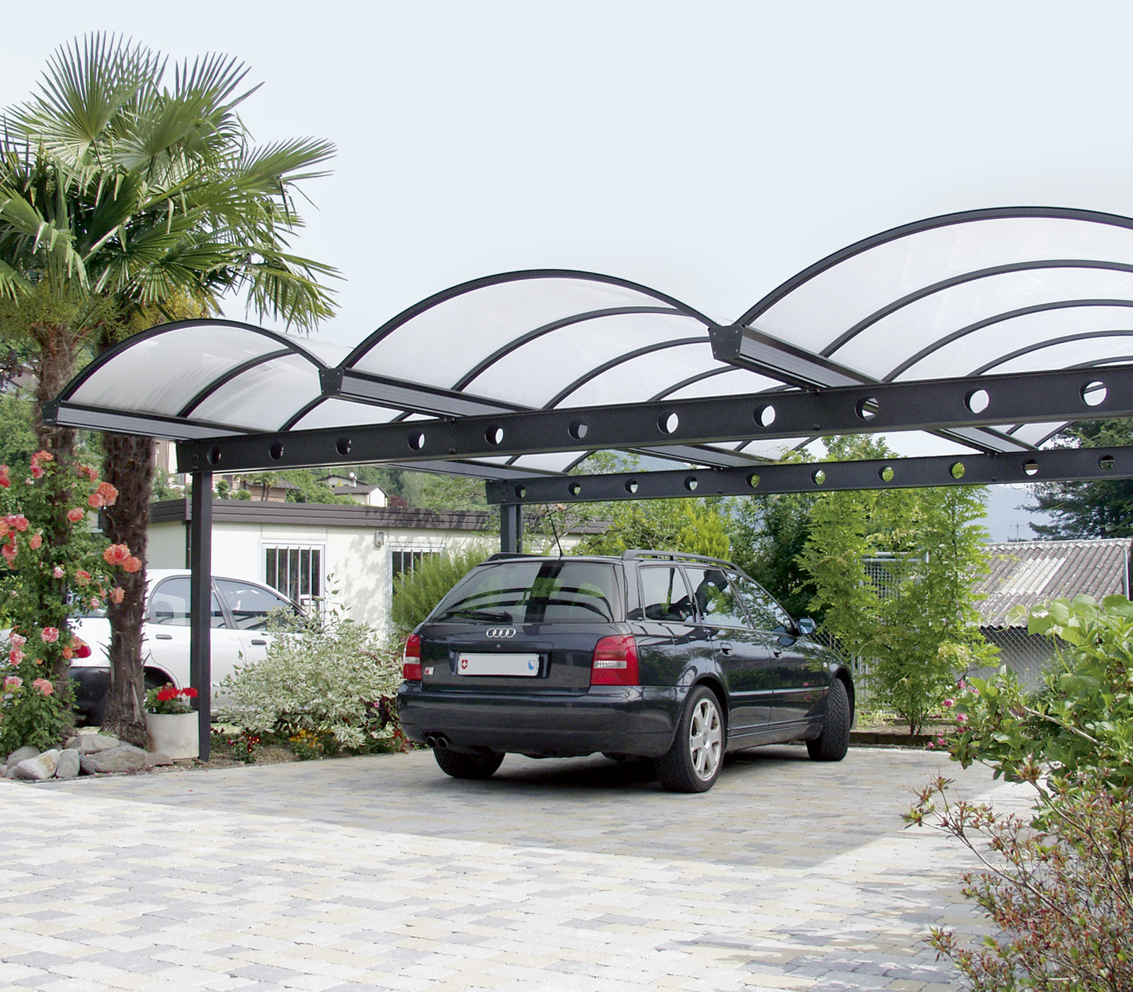 Carport Arco mit Tonnendach aus Plexiglas Röhm