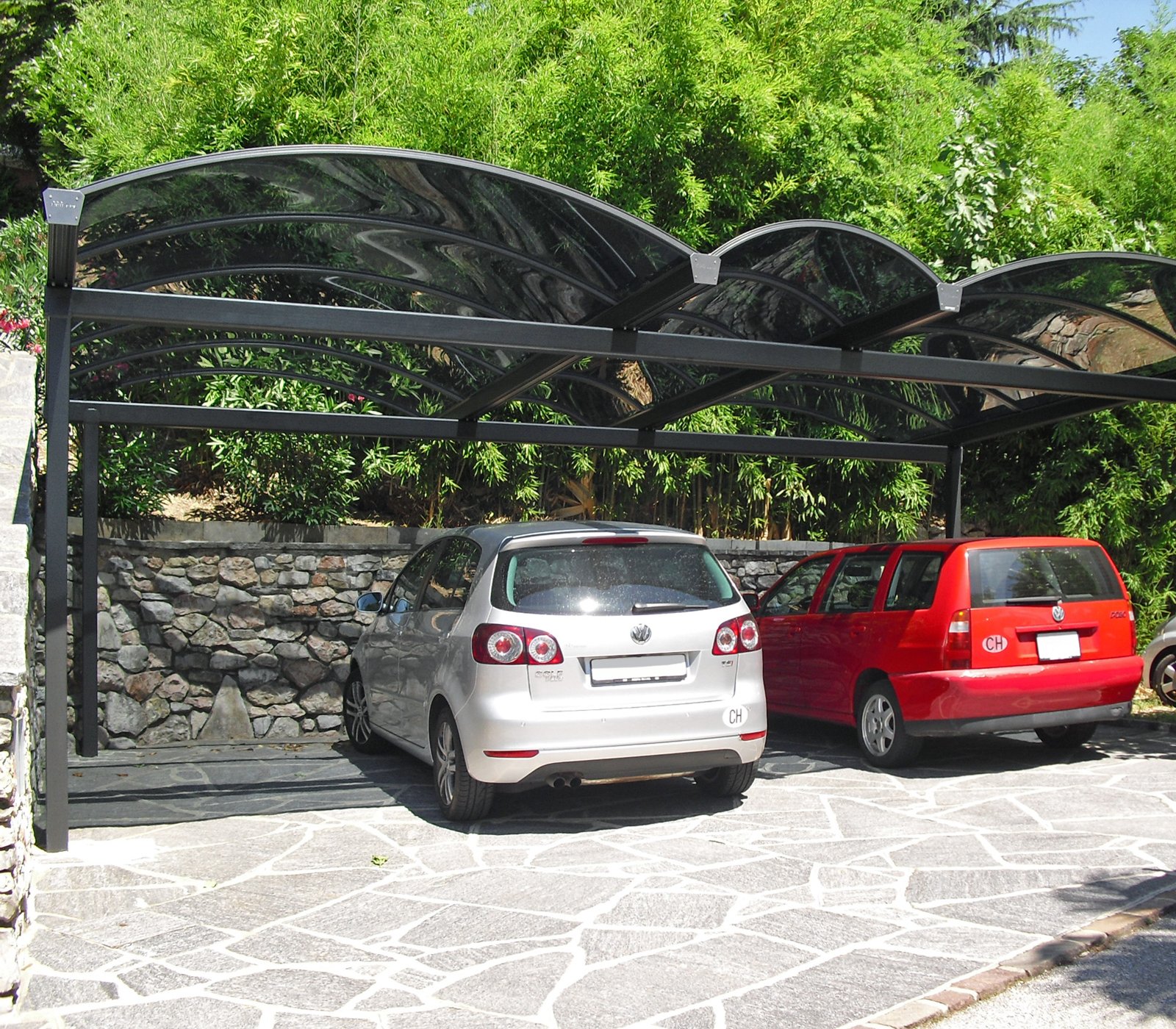 Carport Arco mit Tonnendach aus Plexiglas Röhm