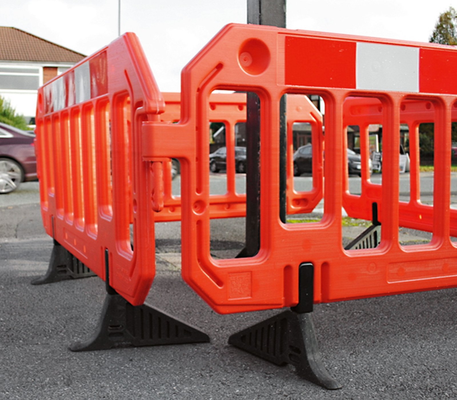 Barrières de chantier en plastique orange avec pieds anti-trébuchement